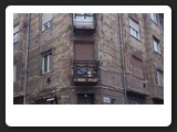 Bullet holes from the 1956 Uprising still visible on the walls of many buildings in District VIII. 