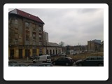 Some empty lots are temporarily used as car parks.